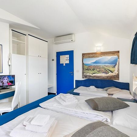 Bike & Wind Hotel Villa Maria Torbole Sul Garda Exterior foto